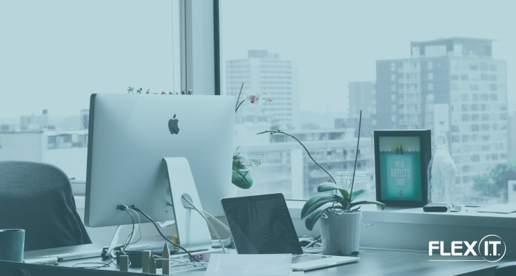 A computer and an iPad in a high-rise office 